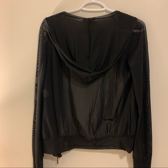 Translucent hooded Black Jacket with golden zipper - Picture 3 of 9